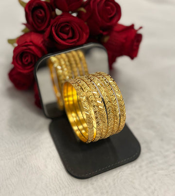 gold-tone bridal bangles
